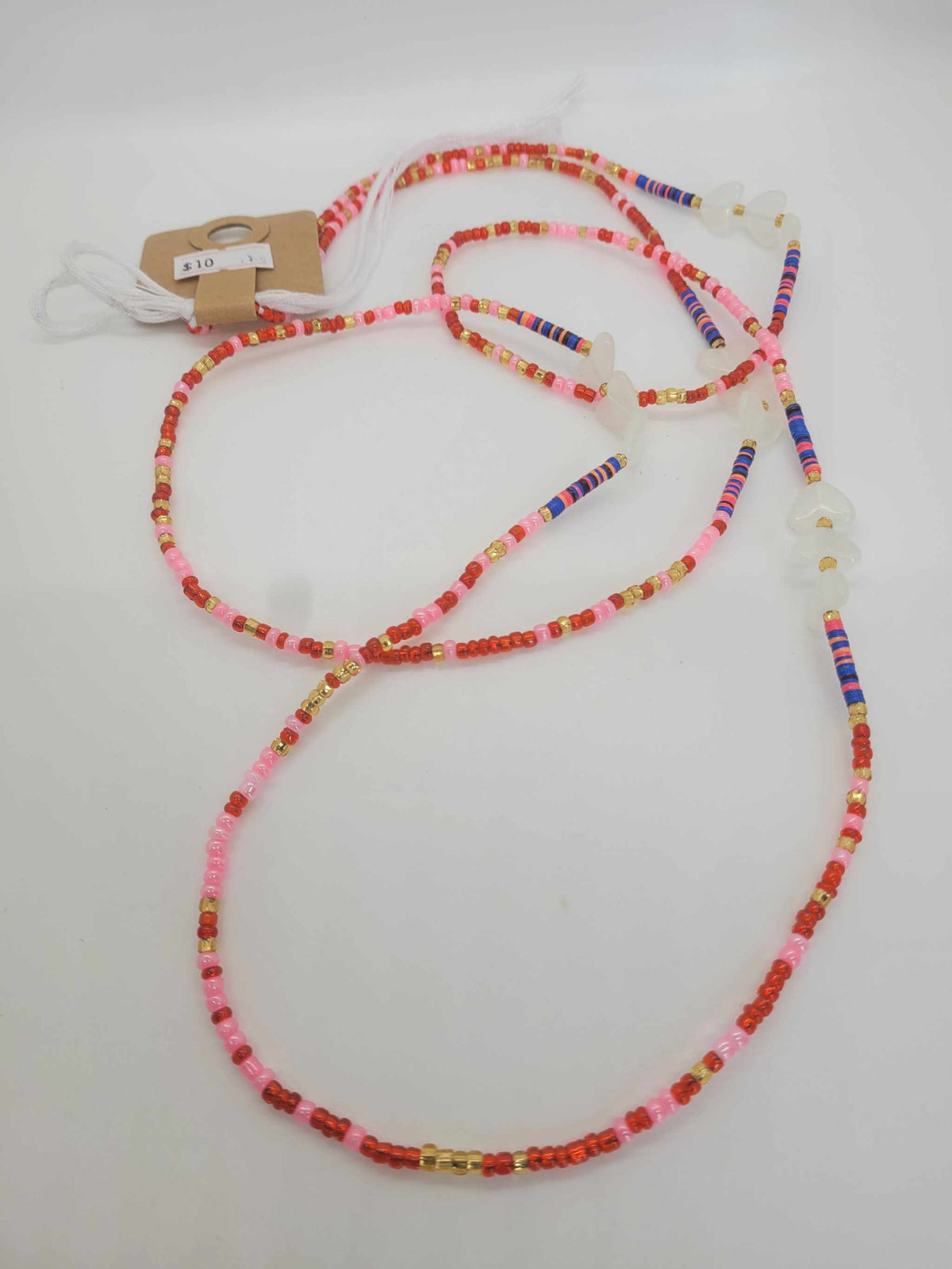 Handmade African Women Waist Bead with pink, red, gold, and blue glass beads on cotton thread