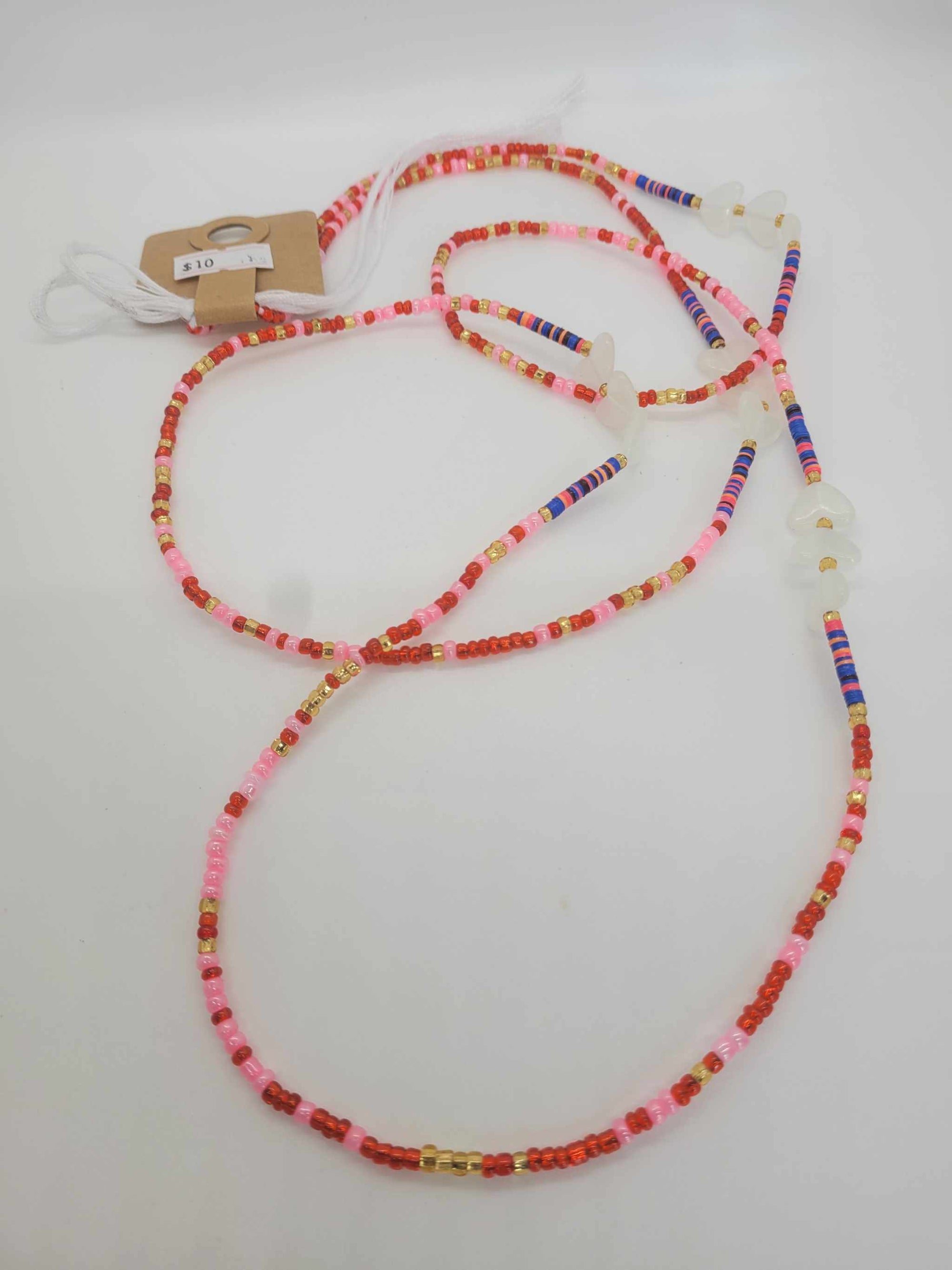 Handmade African Women Waist Bead with pink, red, gold, and blue glass beads on cotton thread