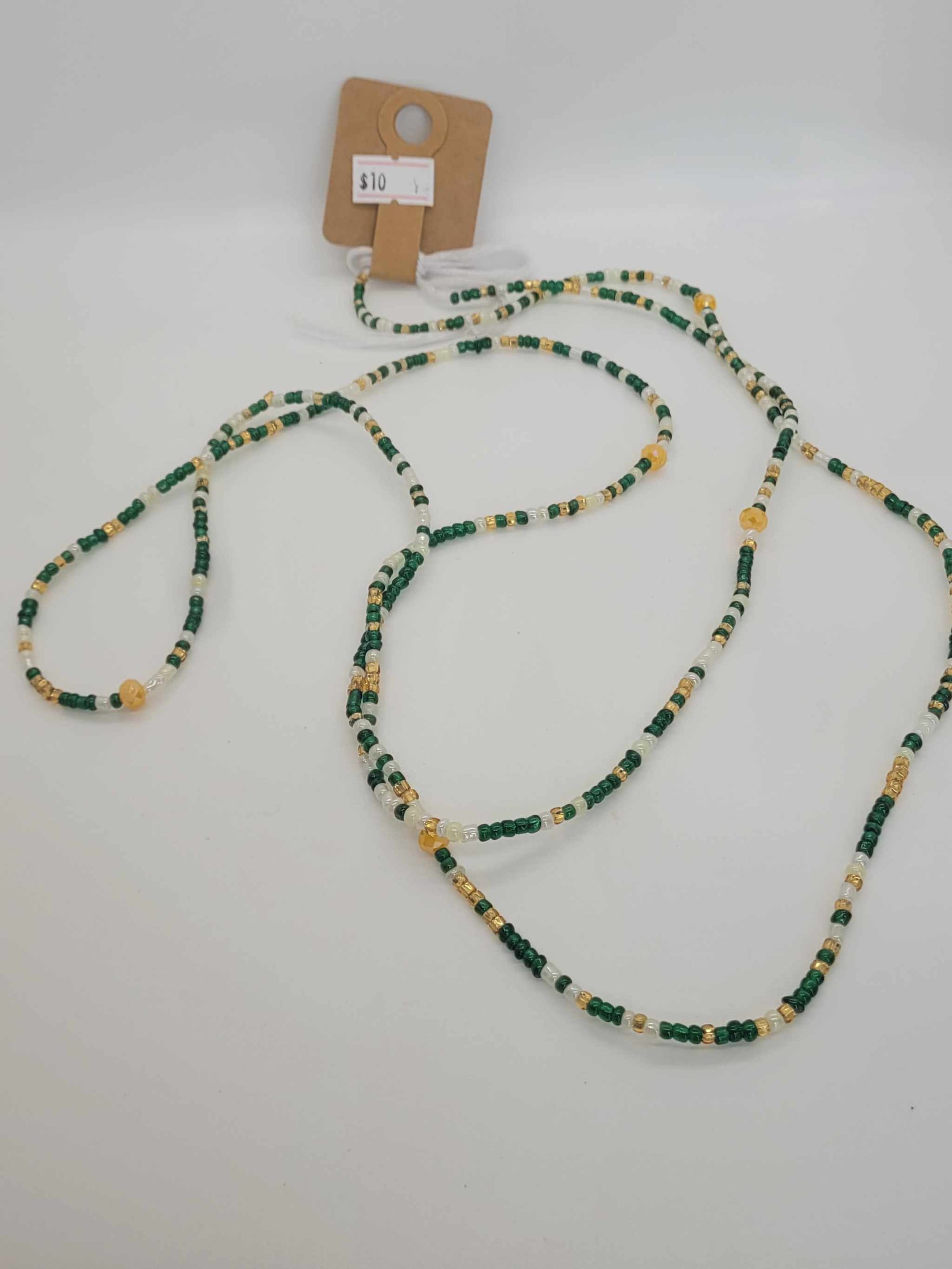 Handcrafted Women Waist Beads in green, white, and yellow, made from authentic African glass beads with a tie-on design for custom fit and body shaping.
