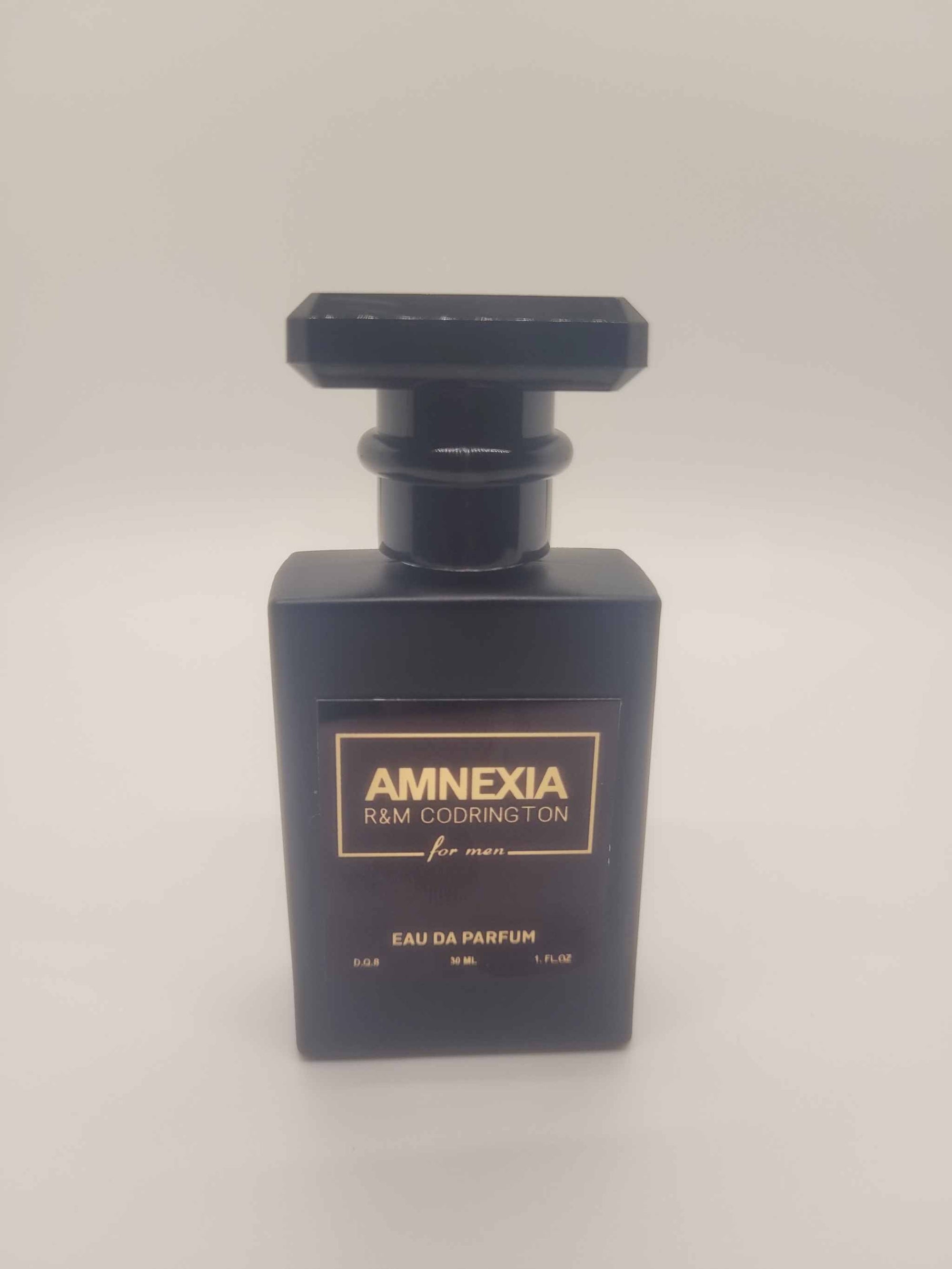 Amnexia Perfume by R&M Codrington black bottle elegant lasting men's fragrance