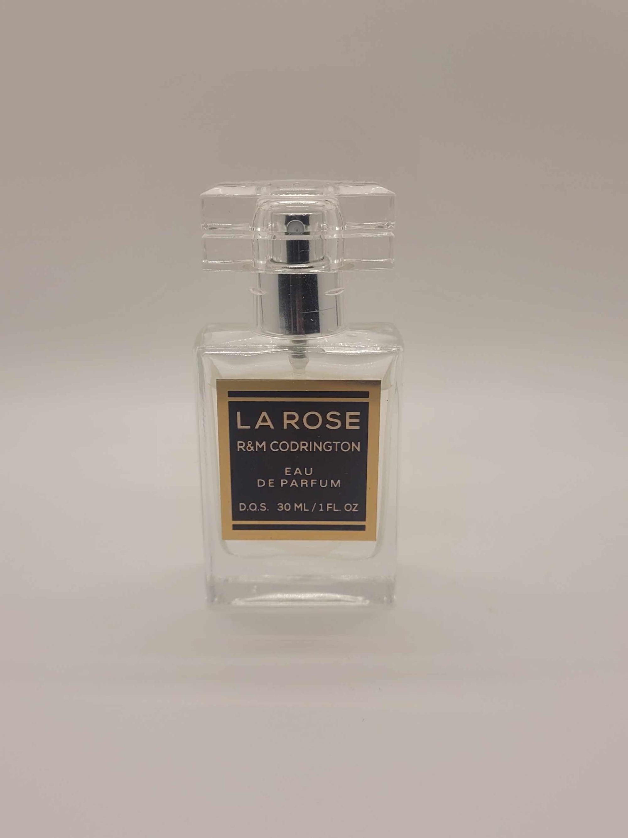 La Rose Perfume pink box with floral design and ingredient list by R&M Codrington