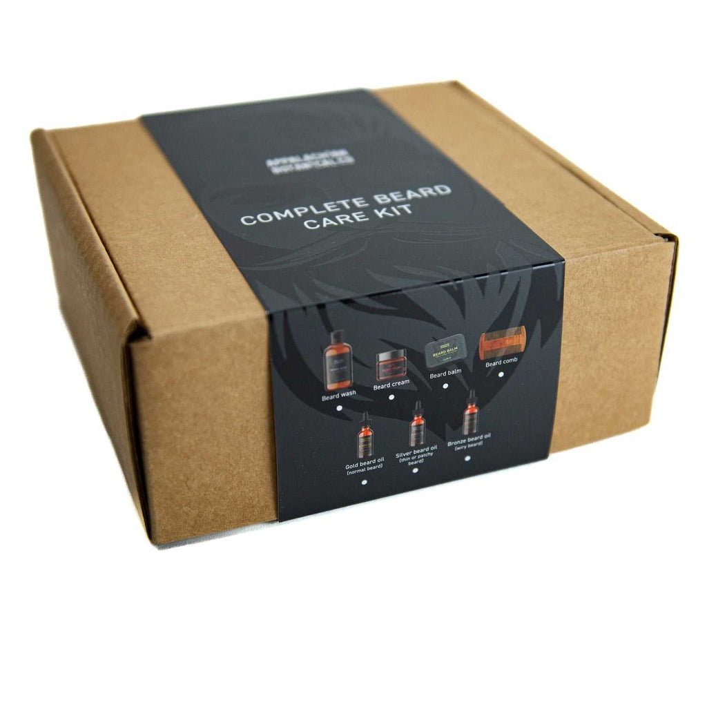 Complete Beard Care Bronze Kit with beard wash, cream, oil, balm, and sandalwood comb in brown box