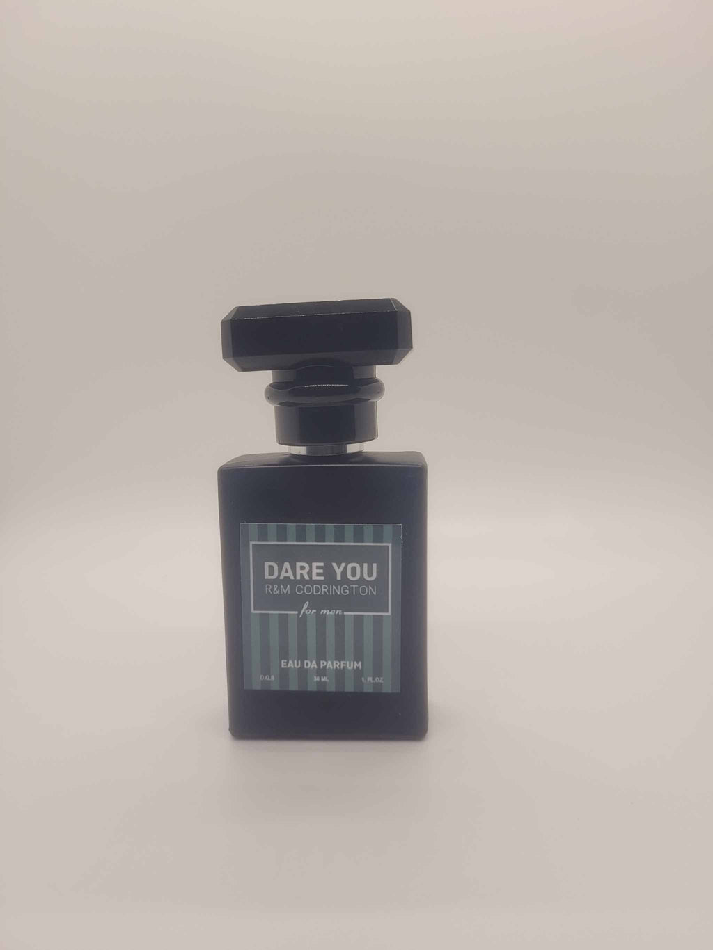 Dare You Perfume for men by R&M Codrington with mandarin, basil, grapefruit, cinnamon, and warm wood fragrance ingredients