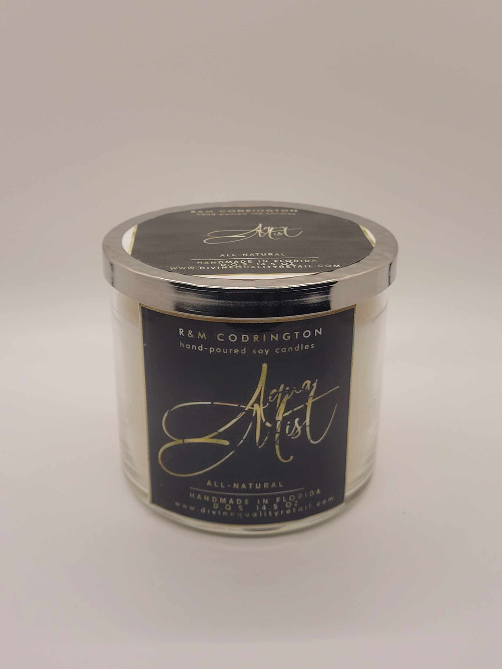 Aqua Mist Scented Candle with three wicks in clear glass jar and silver lid, white soy wax, calming fragrance for aromatherapy and stress relief