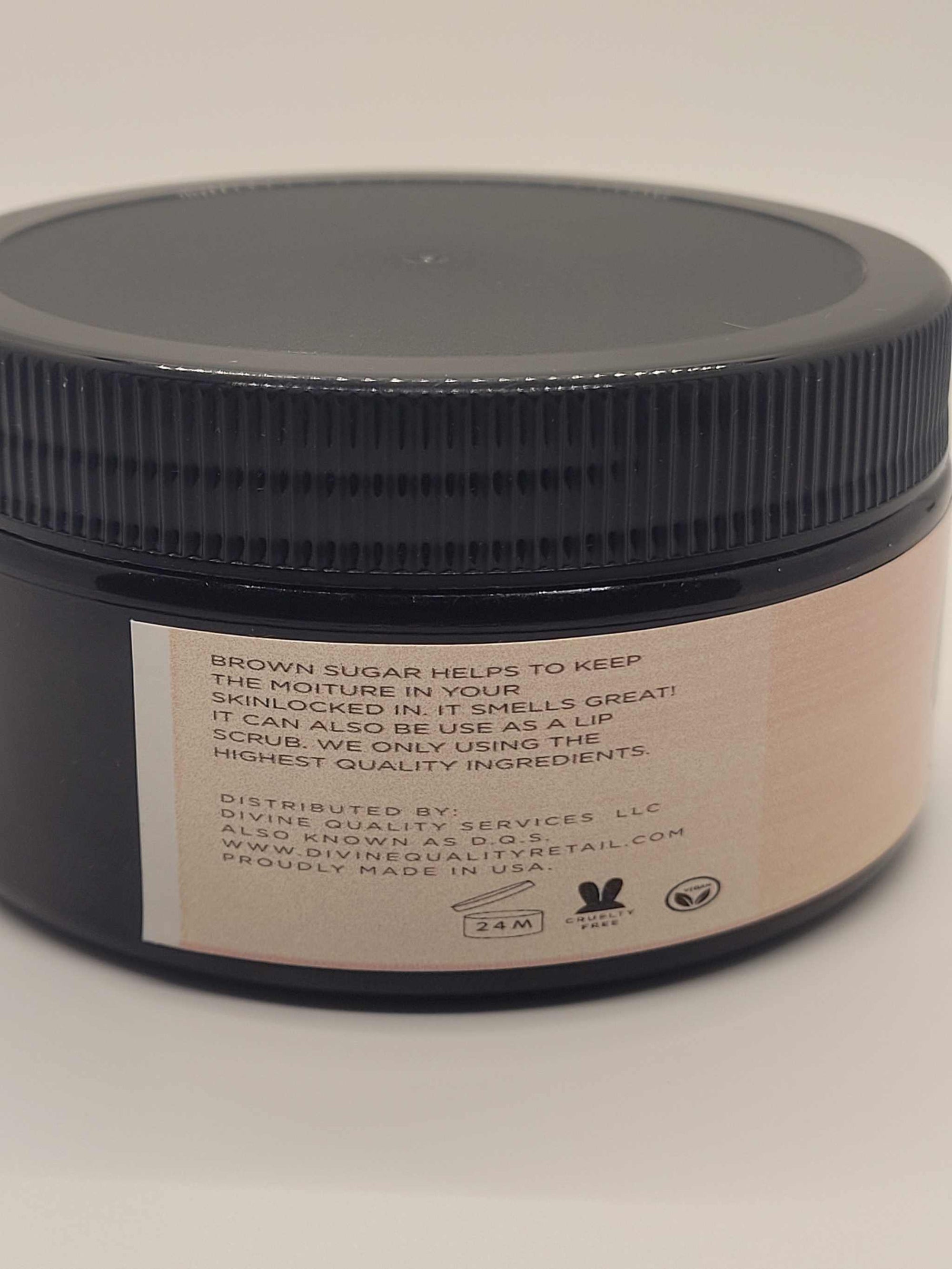 Cherry Blossom Exfoliating brown sugar scrub in an amber jar with black lid