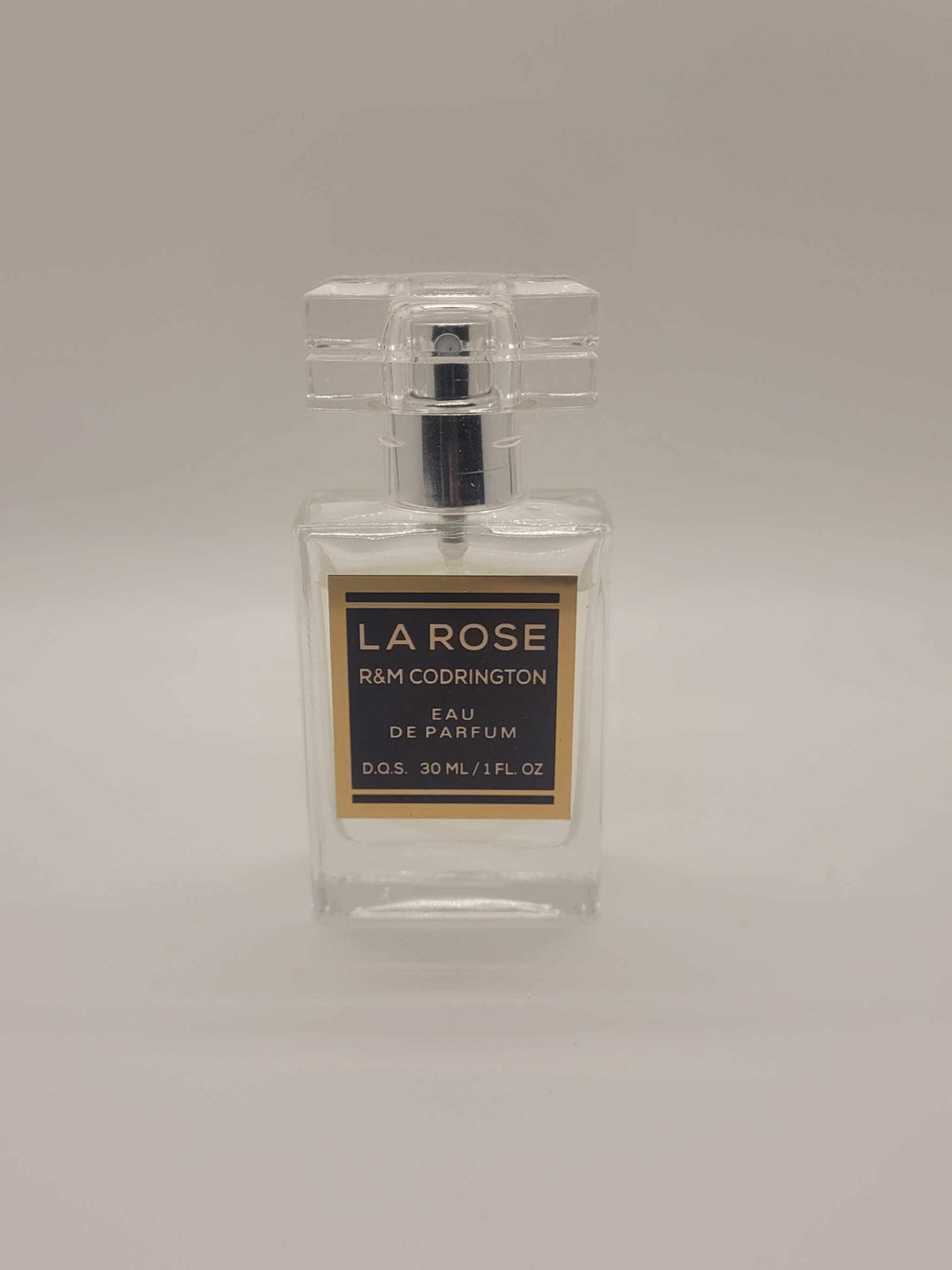La Rose Perfume pink box with floral design and ingredient list by R&M Codrington